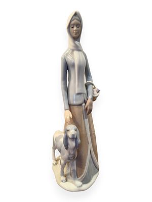 Tengra Porcelain Figurine, Woman With Dog. A Tengra porcelain figurine depicting a woman with a 