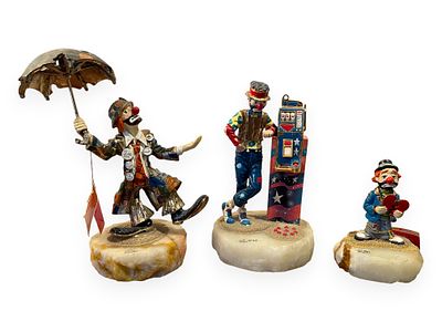 Three Ron Lee Clown Figurines, including a Hobo Clown with Umbrella. A collection of three 