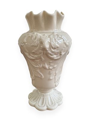 A Belleek Rathmore Porcelain Vase. A Belleek Rathmore porcelain vase, featuring a footed 