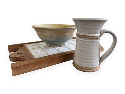Three Studio Pottery Items and a Wooden Trivet. A group of three items comprising two pieces of 
