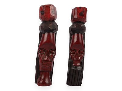 A Pair of Jamaican Hand-Carved Wood Tiki Totem Figures. A pair of Jamaican hand-carved wood tiki 