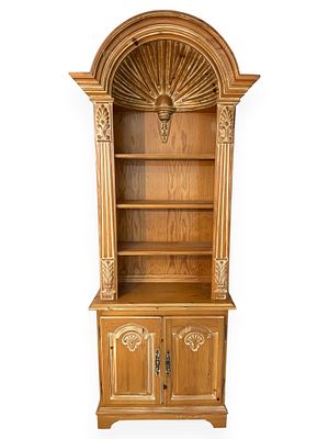 Late 20th Century English Neoclassical Style Carved Pine Bookcase Cabinet. A two-part English 