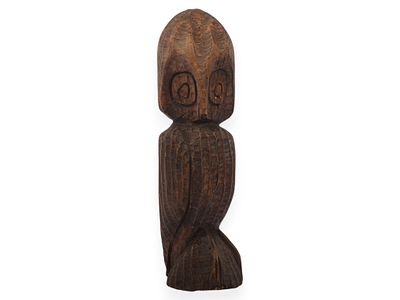 Mid-century Hand-Carved Hardwood Owl Figure. This stylized owl figure is hand-carved from a 