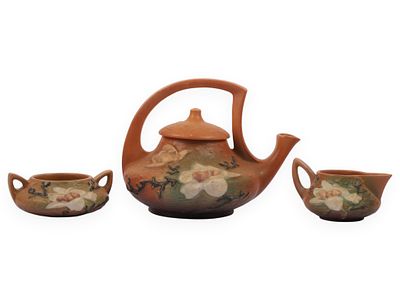 A Trio of Roseville Pottery Magnolia Pattern Tableware Items. A three-piece American art pottery 