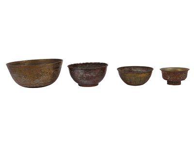 A Group of Four Decorative Metal Bowls of Mixed Origins. This lot comprises four graduating 
