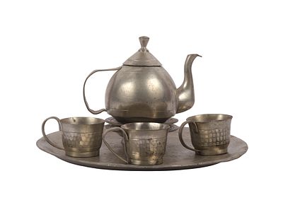 A Set of Hammered Pewter Miniature Tea Service Items. A set of miniature pewter tea service 