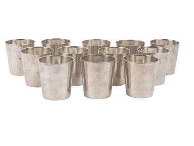 Set of Eleven Indonesian Hand-Wrought Pewter Tumblers. A set of eleven pewter tumblers 