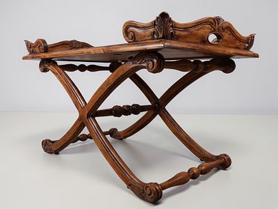 Renaissance Revival Style Carved Wood Curule-Base Low Table. A Renaissance Revival style carved 