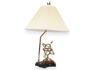 Vintage Brass-Toned Armillary Sphere Table Lamp. This table lamp features a central decorative 