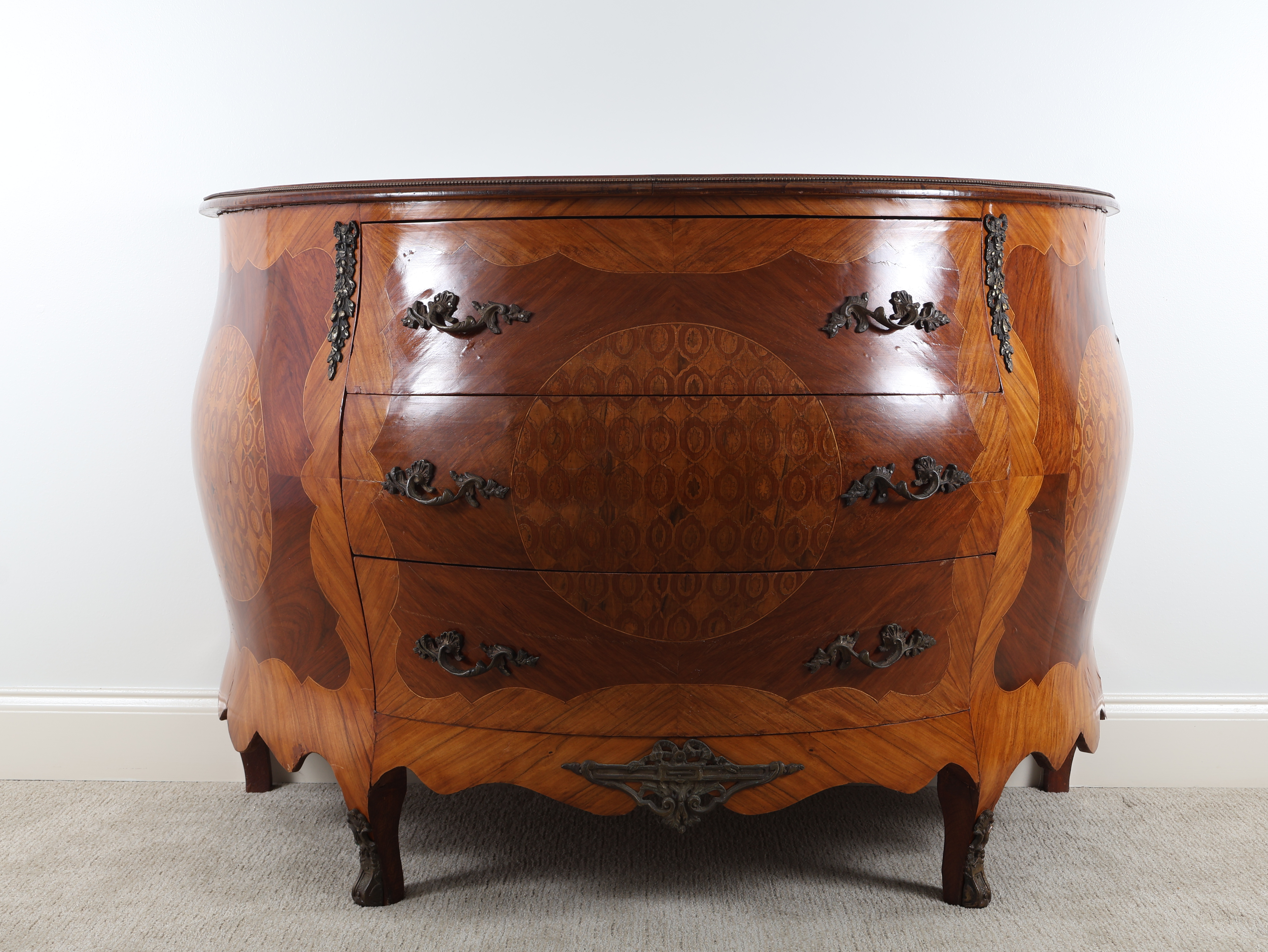 A Louis XV Style Marquetry Bombé Commode
