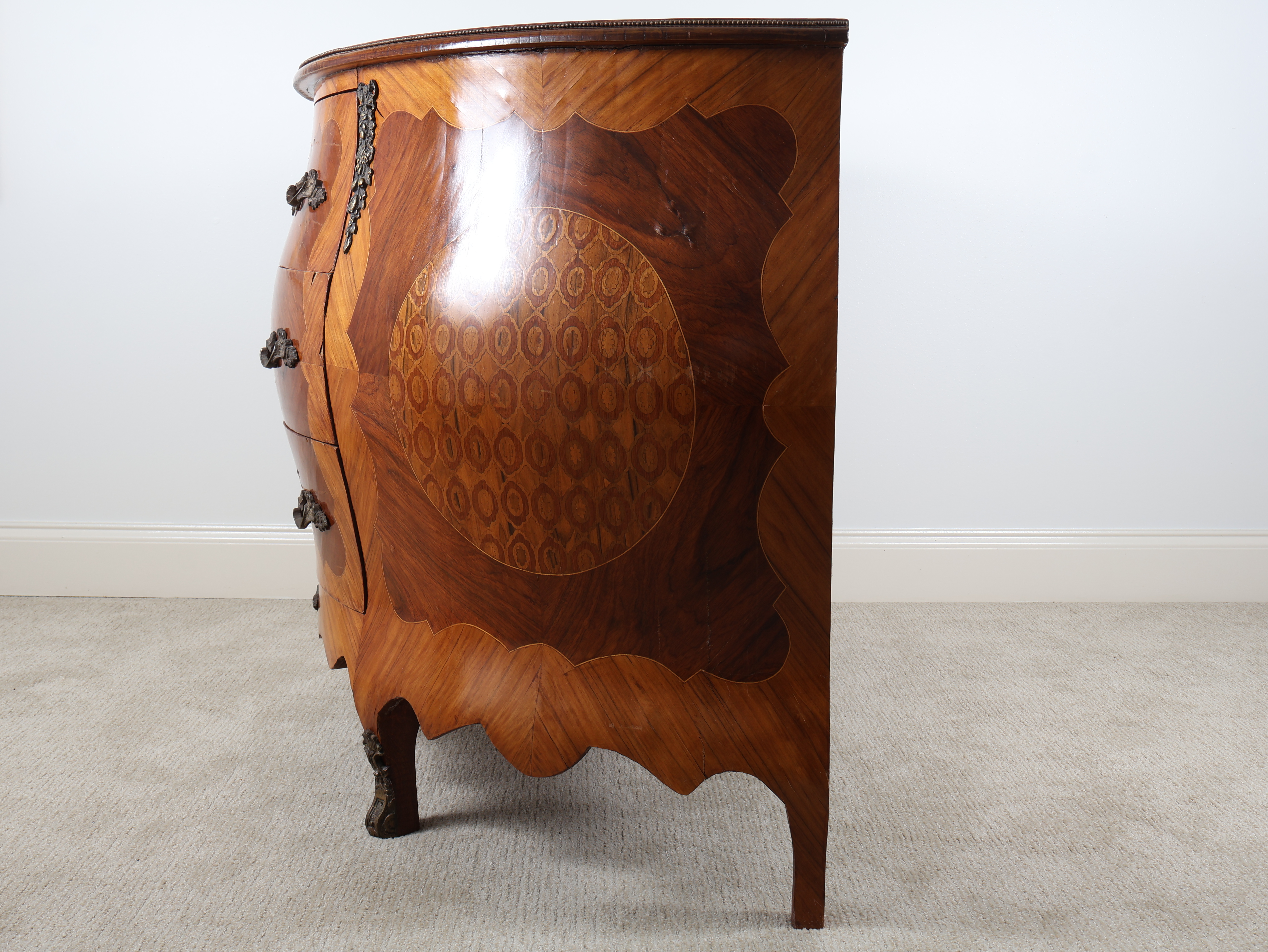 A Louis XV Style Marquetry Bombé Commode