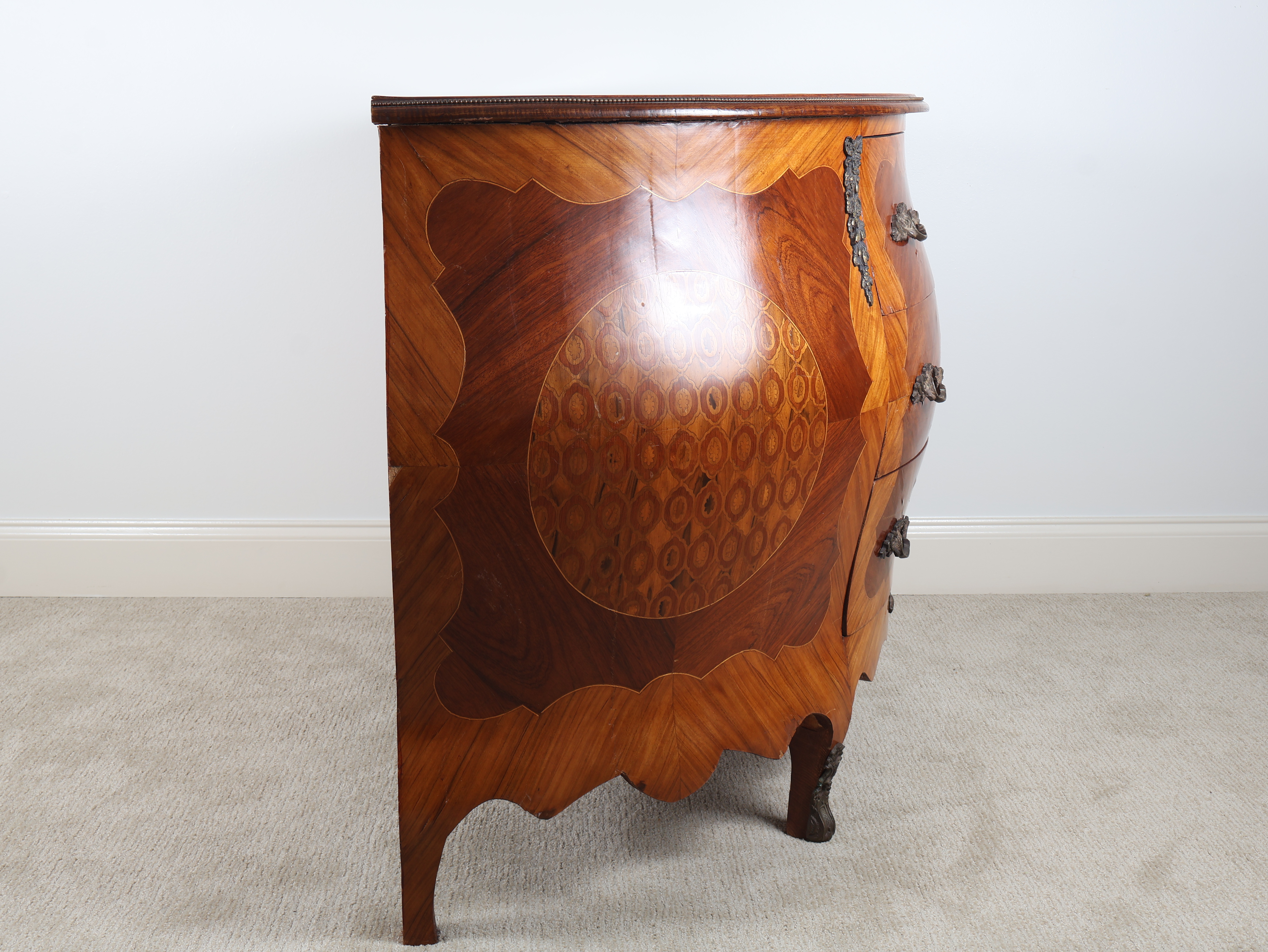 A Louis XV Style Marquetry Bombé Commode