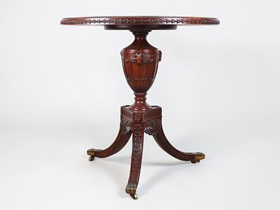 Regency Style Carved Mahogany Center Table with Inset Stone Top. This circular center table is 