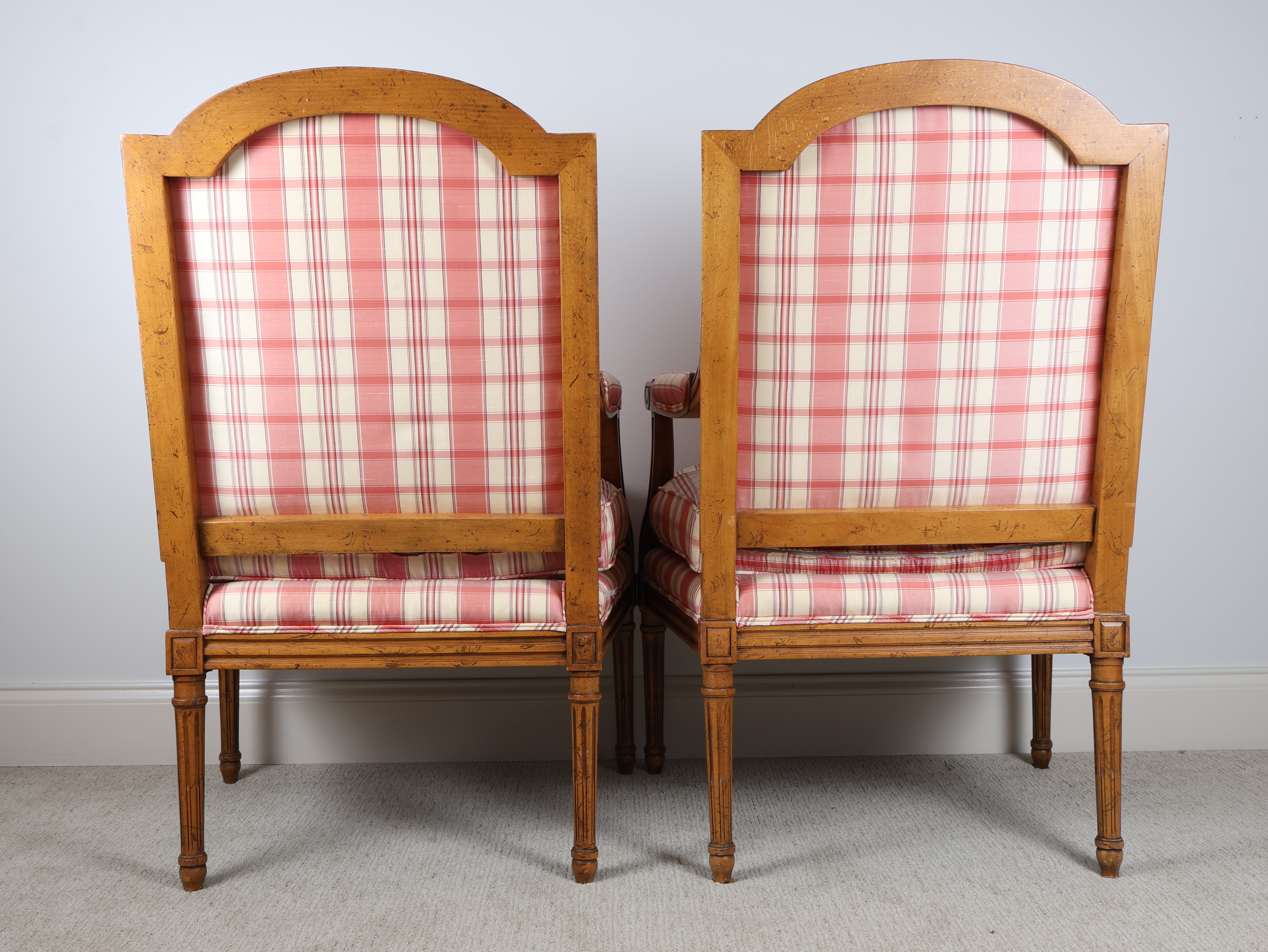 A Pair of Baker Furniture Louis XVI Style Upholstered Armchairs