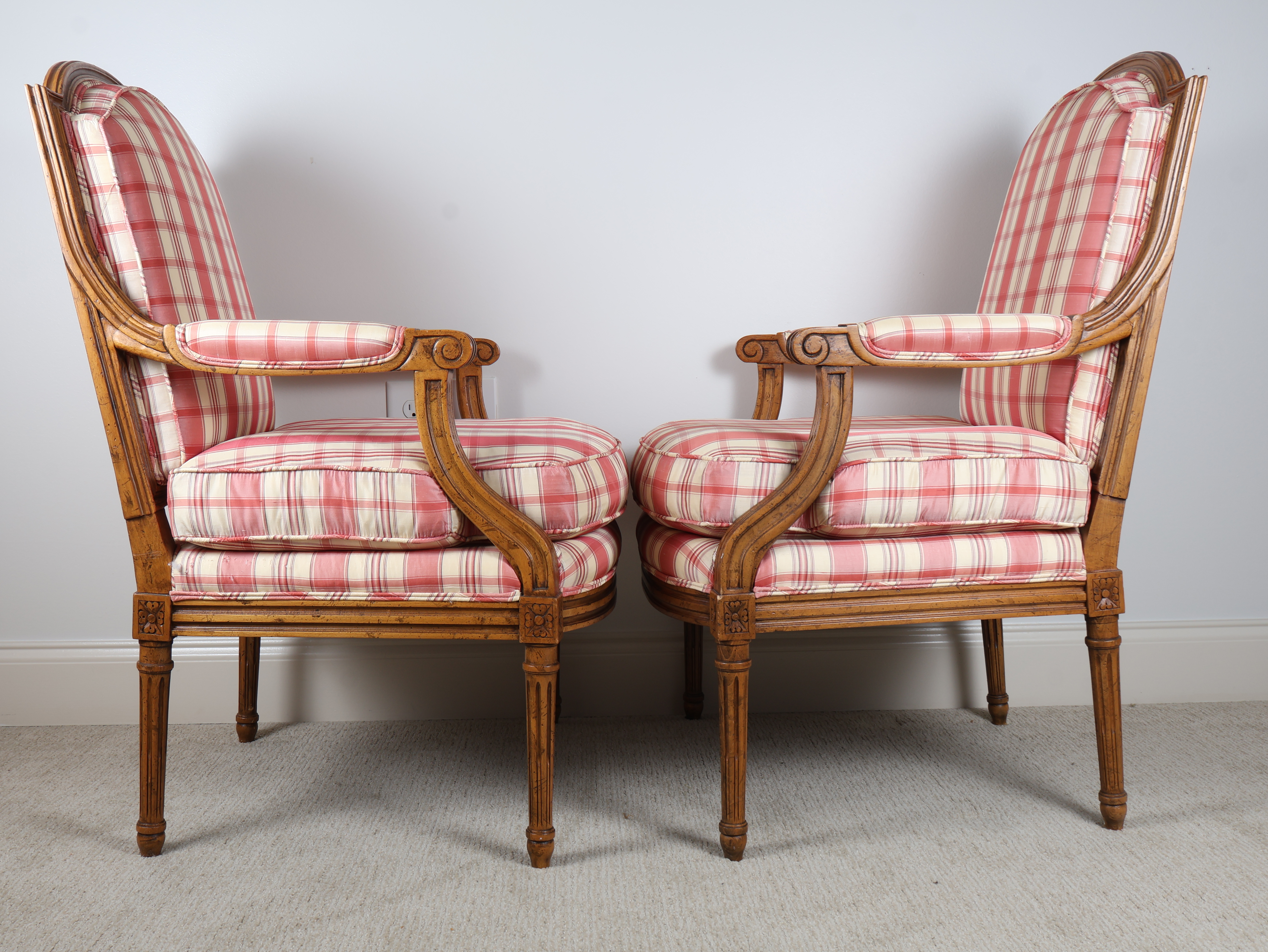 A Pair of Baker Furniture Louis XVI Style Upholstered Armchairs