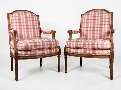 A Pair of Baker Furniture Louis XVI Style Upholstered Armchairs. A pair of Louis XVI style open 