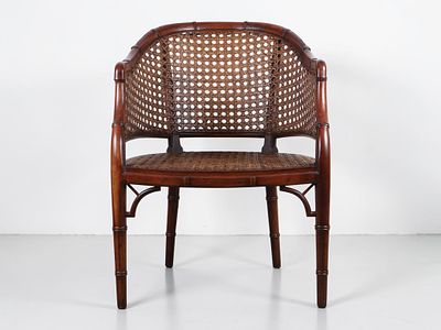 Chinoiserie Style Faux Bamboo and Cane Tub Armchair. A single Chinoiserie style tub armchair 