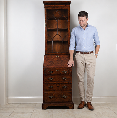 George III Style Narrow Burr Walnut Bureau Bookcase. This George III style bureau bookcase is 