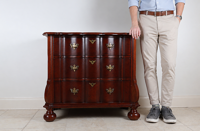 Mahogany Dutch Baroque Style Three Drawer Bombe Bachelor Chest. A three-drawer bachelor chest or 