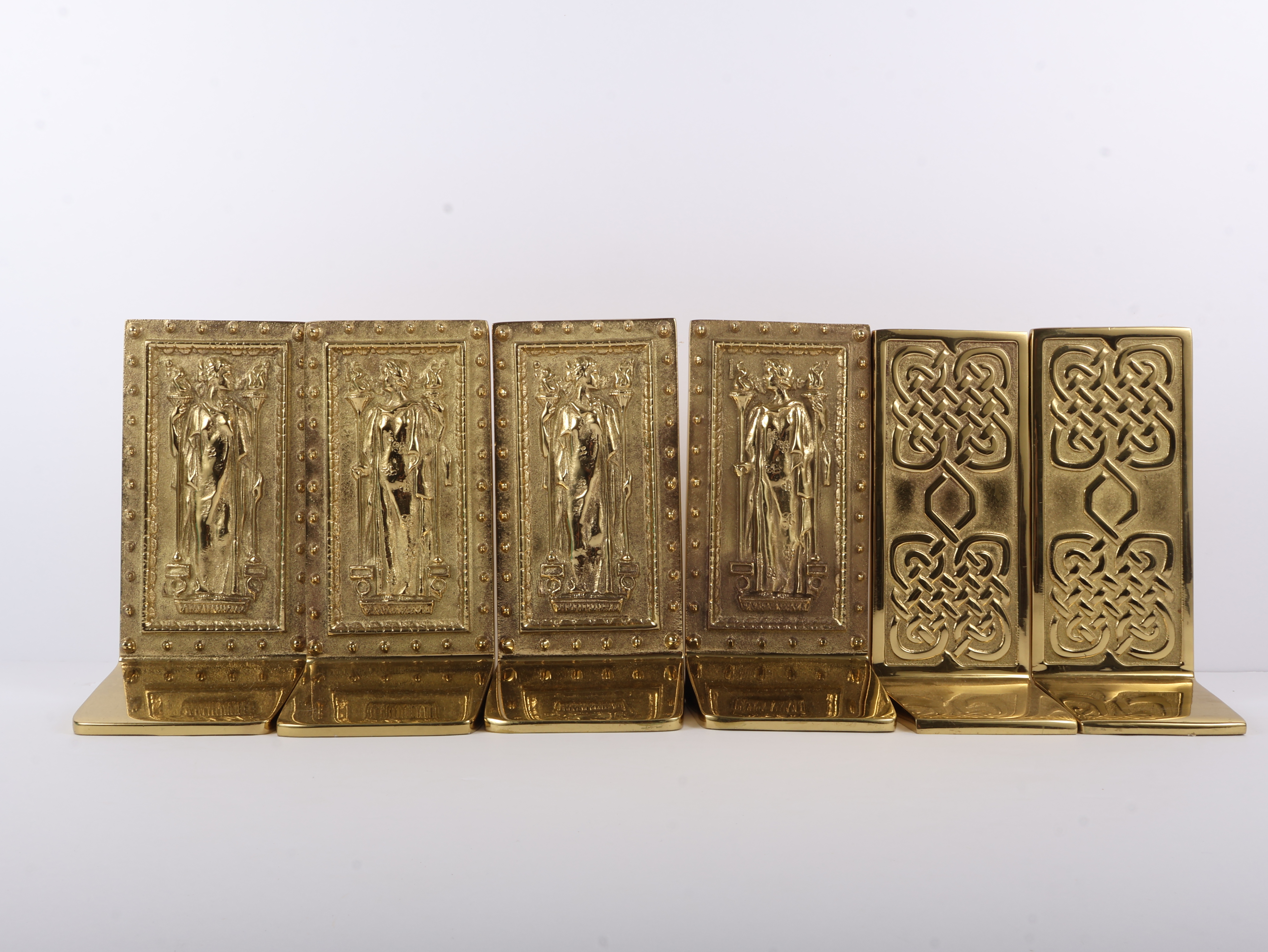 A Set of Virginia Metalcrafters Polished Solid Brass Bookends Including Library of Congress and Celtic Knot Patterns