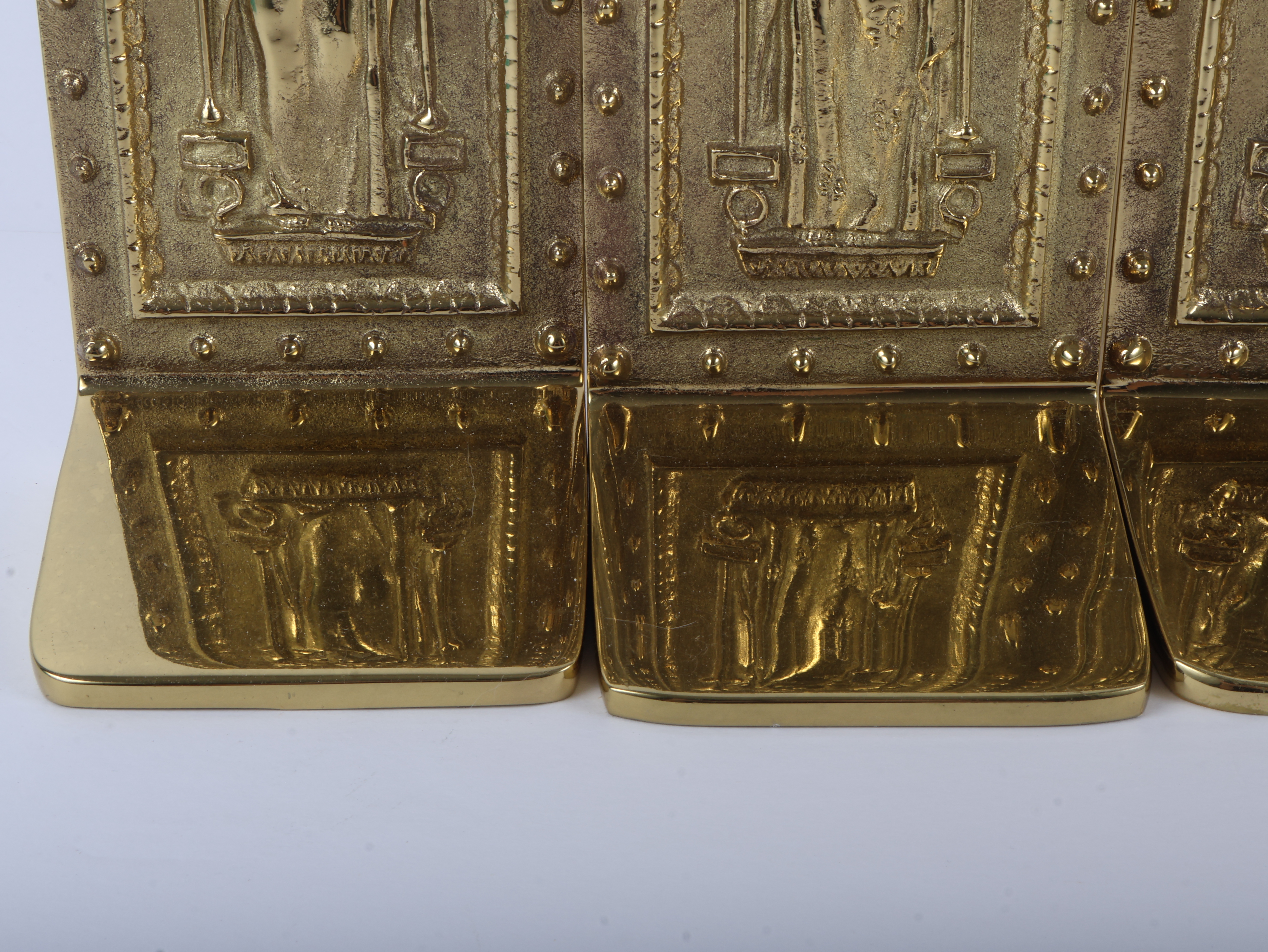 A Set of Virginia Metalcrafters Polished Solid Brass Bookends Including Library of Congress and Celtic Knot Patterns