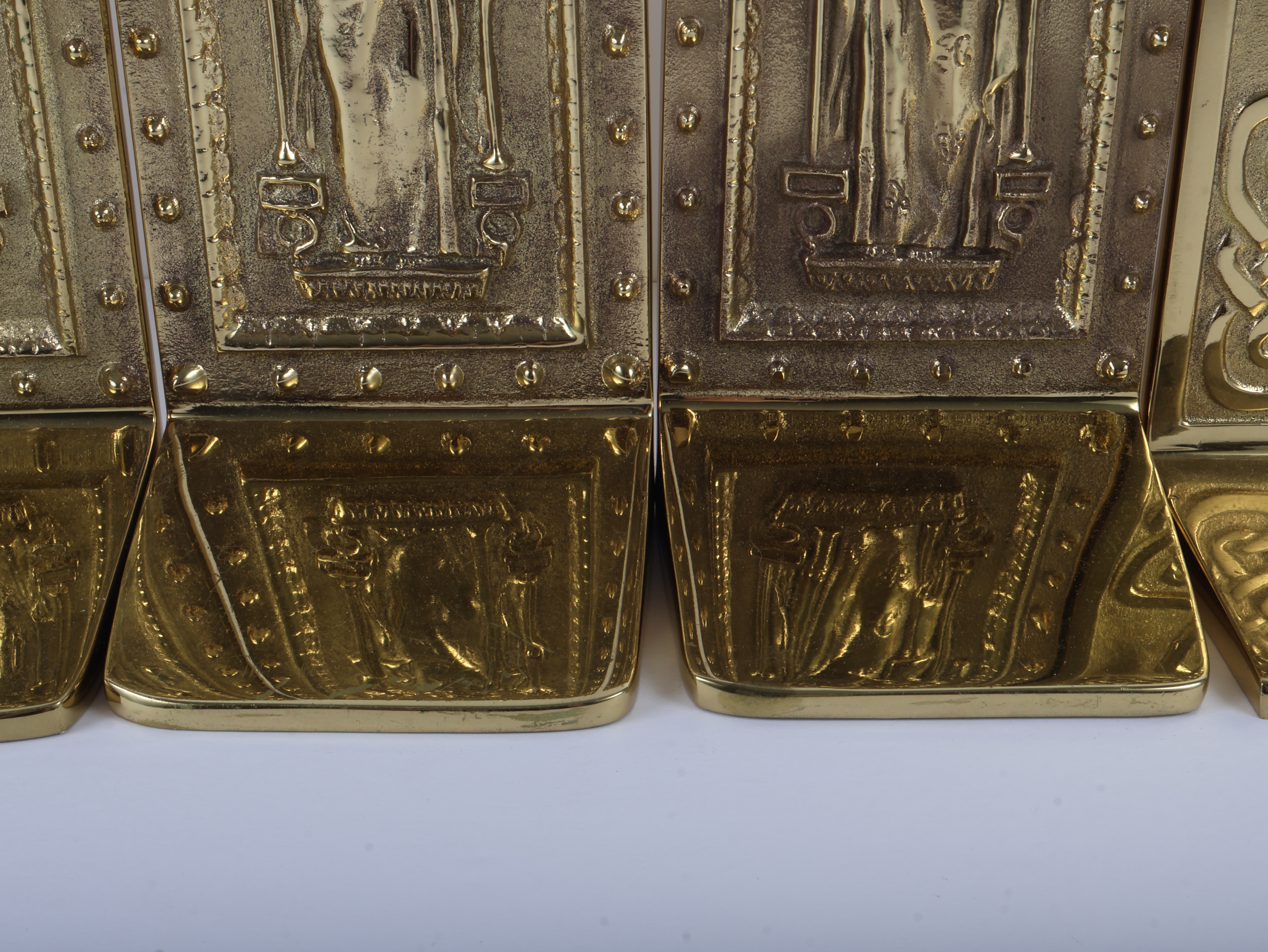 A Set of Virginia Metalcrafters Polished Solid Brass Bookends Including Library of Congress and Celtic Knot Patterns