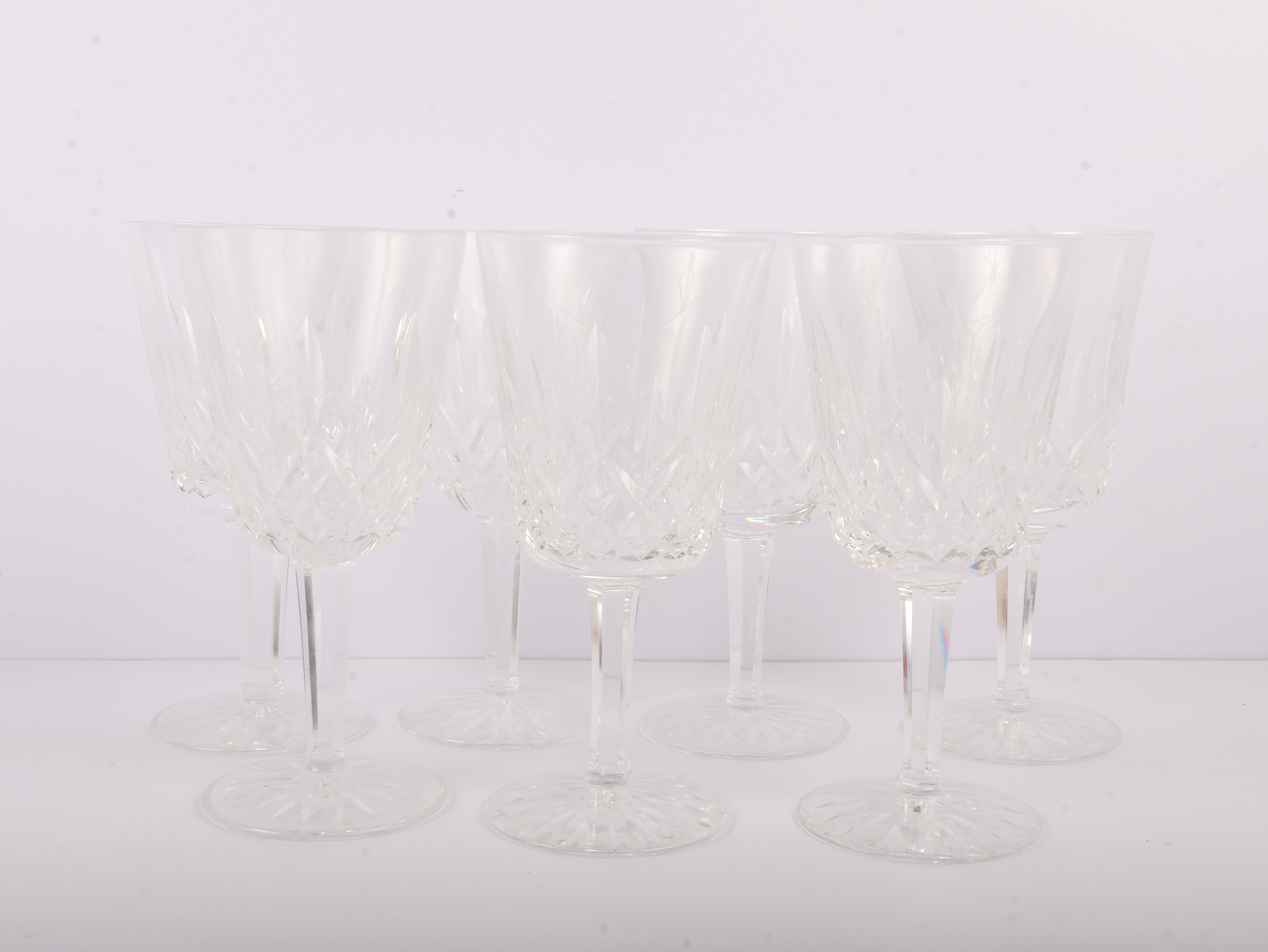 A Set of Seven Waterford Crystal Lismore Water Goblets