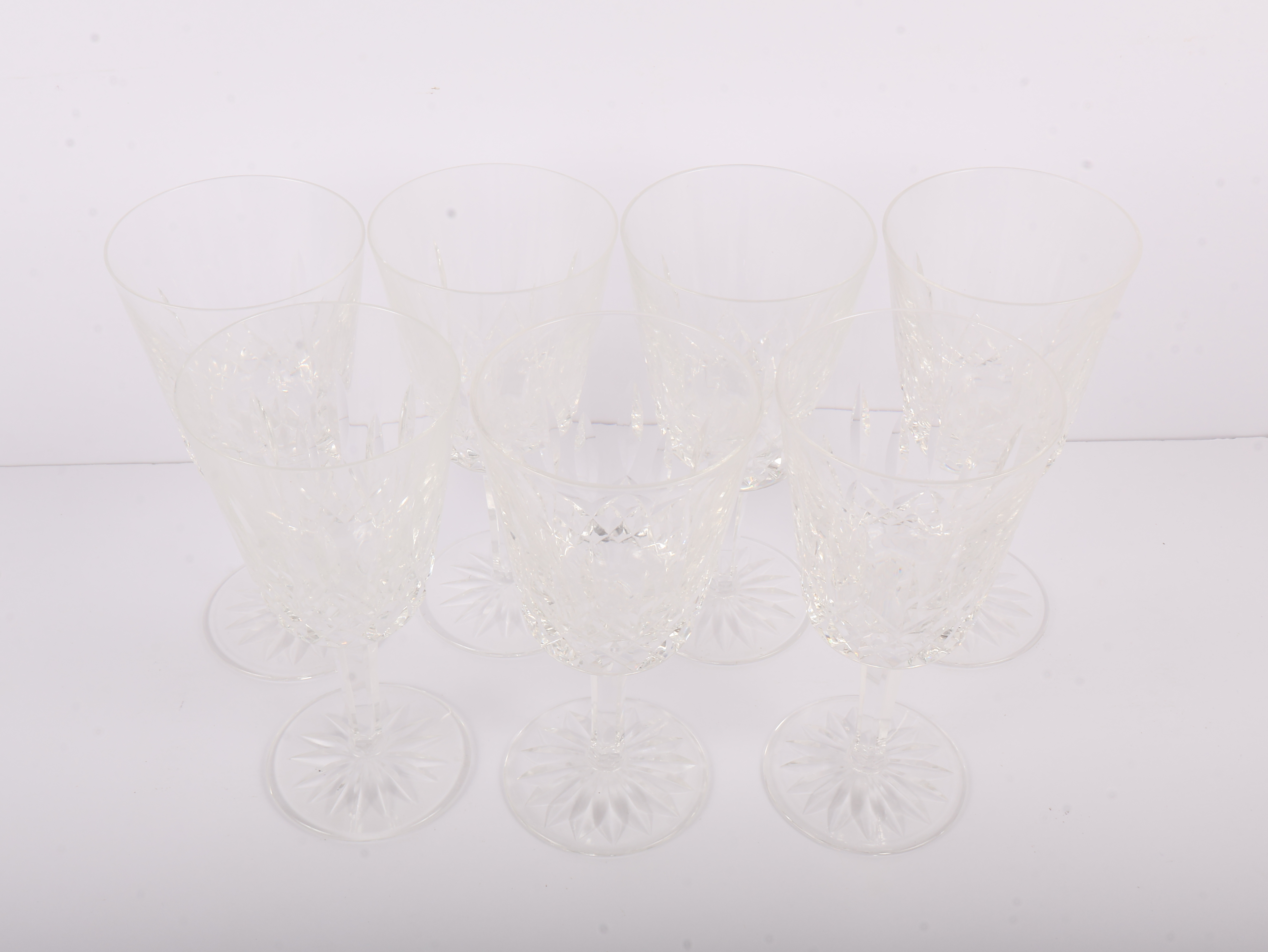 A Set of Seven Waterford Crystal Lismore Water Goblets