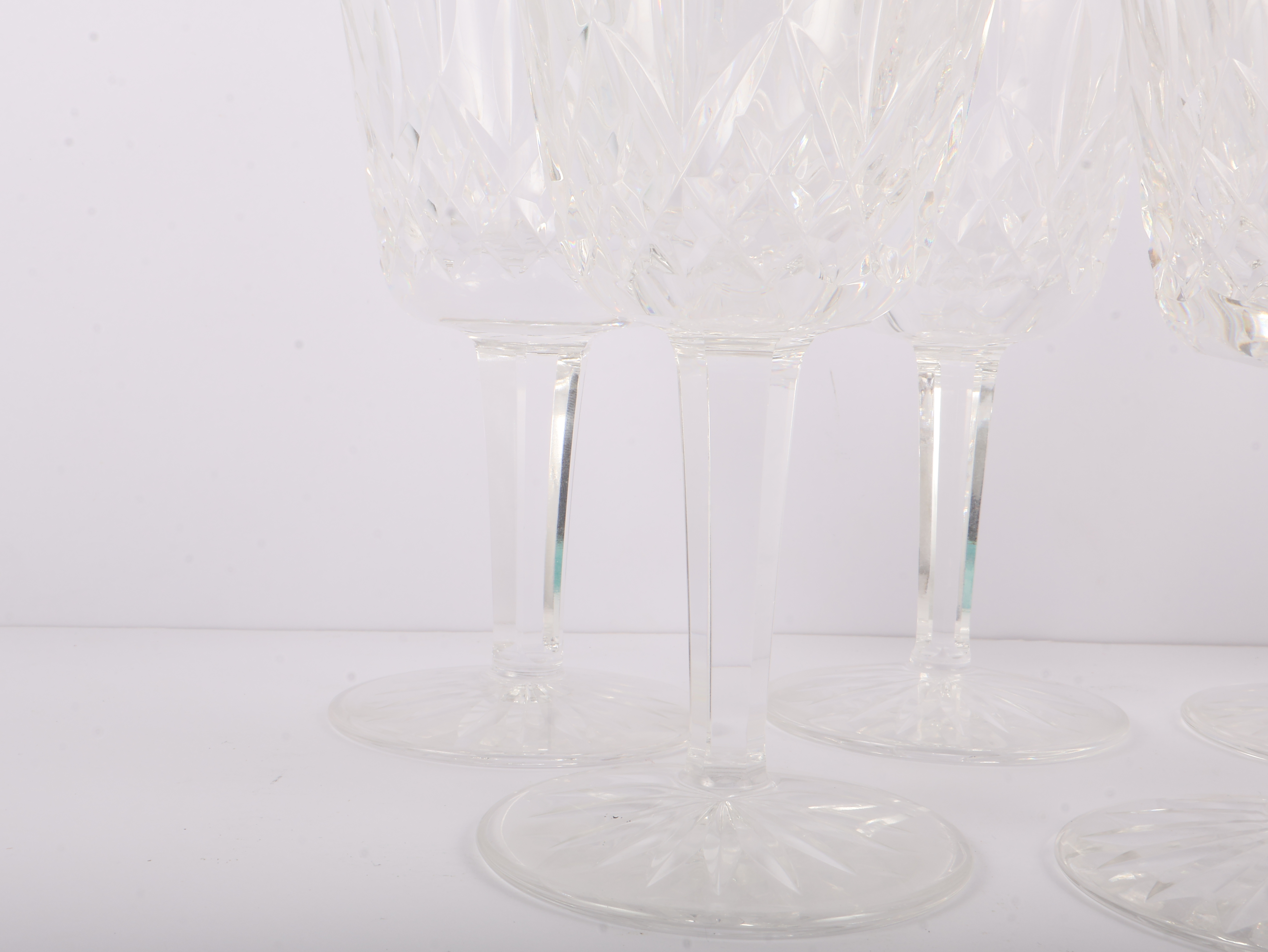 A Set of Seven Waterford Crystal Lismore Water Goblets