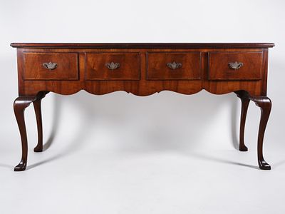 Queen Anne Style Mahogany Four Drawer Server. A mahogany server in the Queen Anne style 