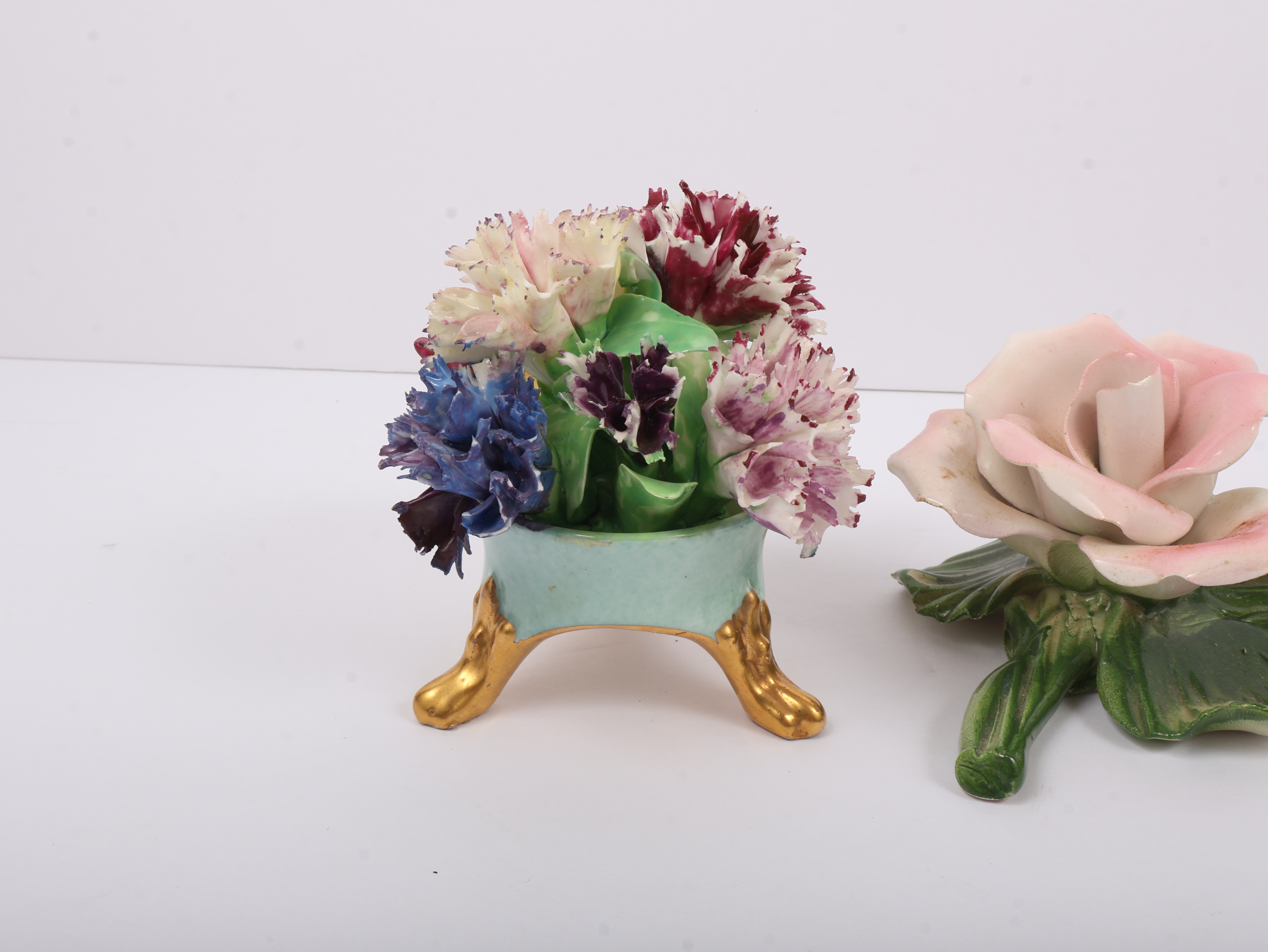 An Assortment of Capodimonte and Crown Staffordshire Porcelain and Bone China Floral Figurines