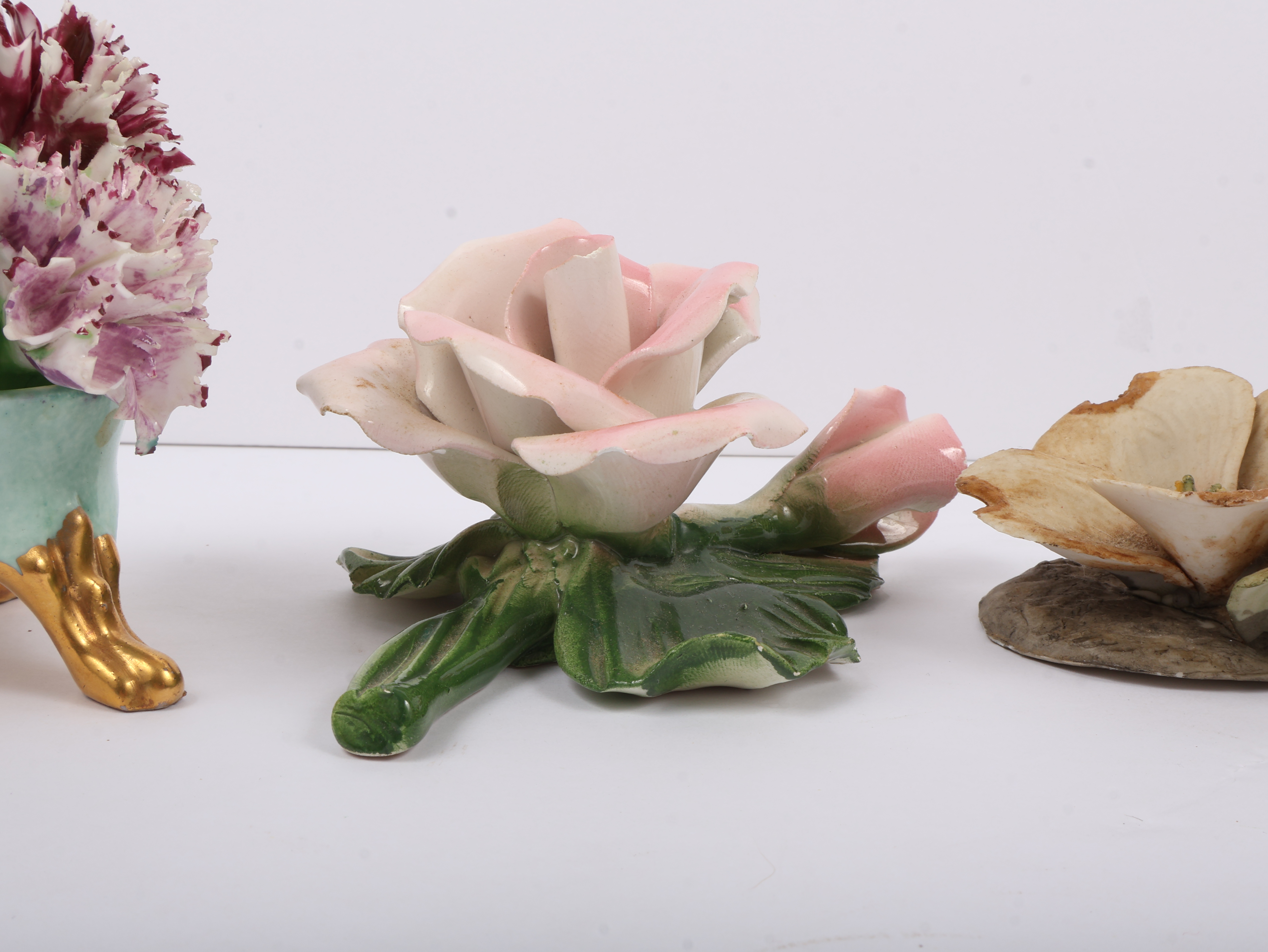 An Assortment of Capodimonte and Crown Staffordshire Porcelain and Bone China Floral Figurines