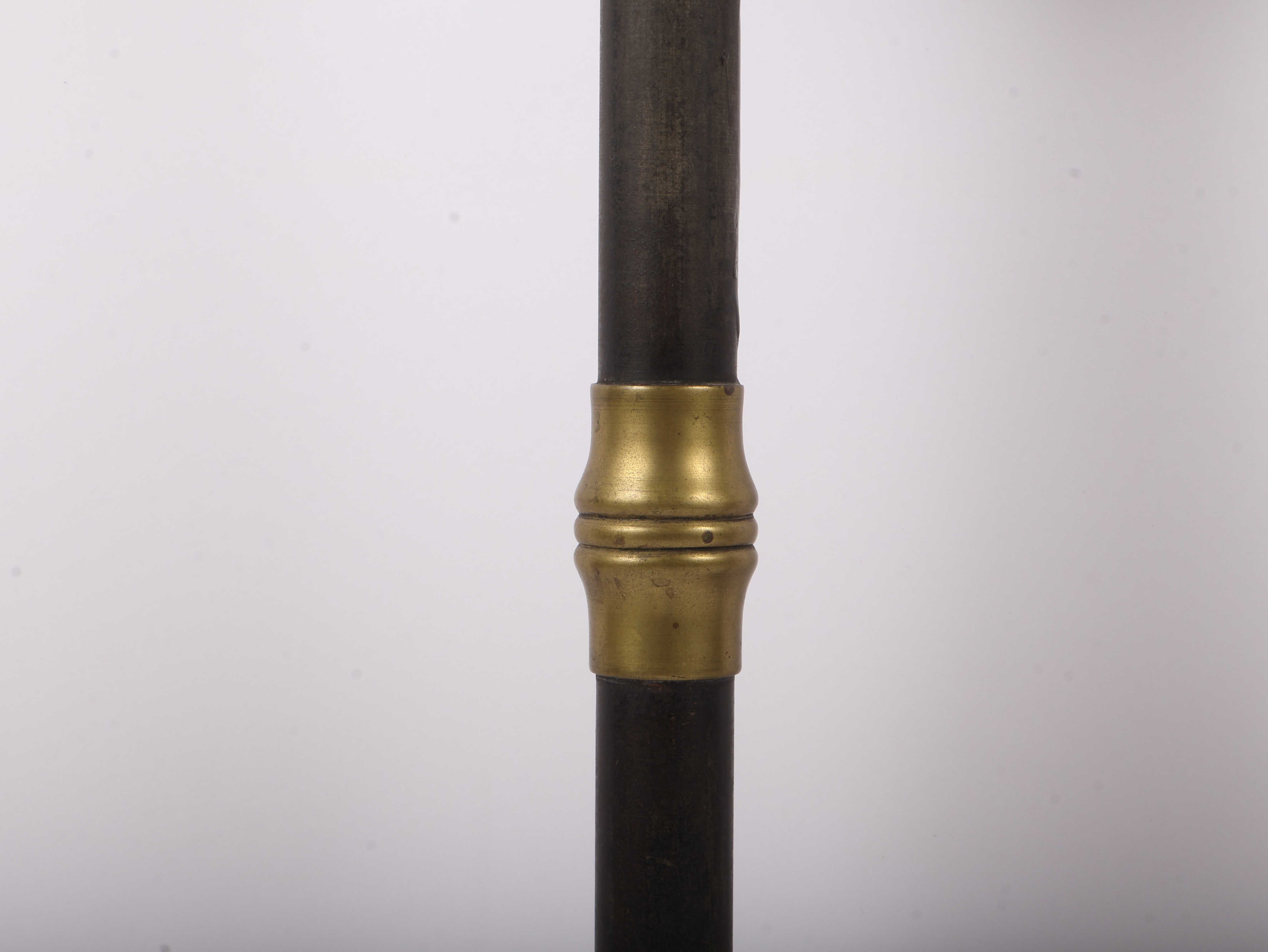 A Pair of Large Late 19th Century Patinated Iron and Turned Brass Candlesticks