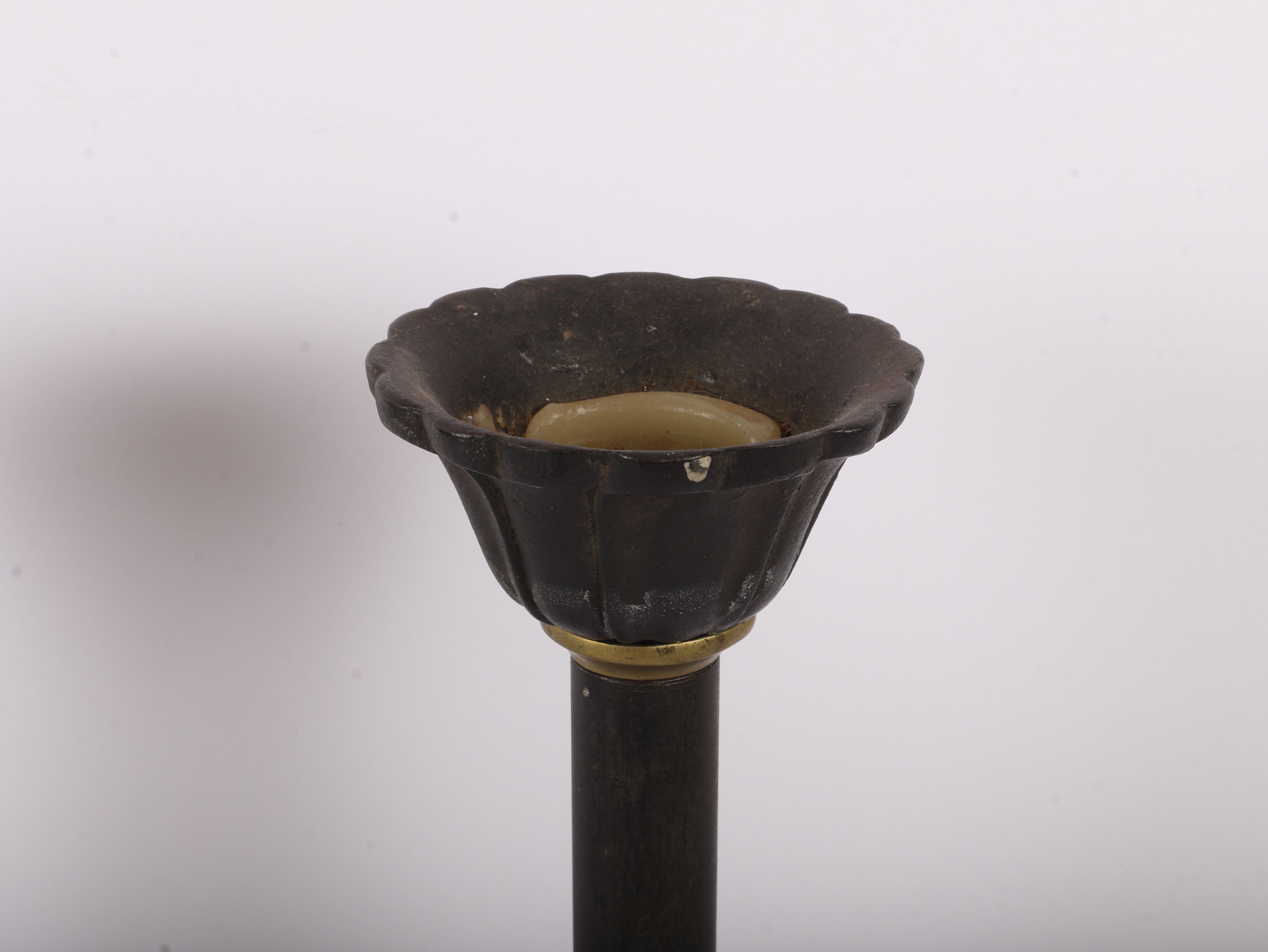 A Pair of Large Late 19th Century Patinated Iron and Turned Brass Candlesticks