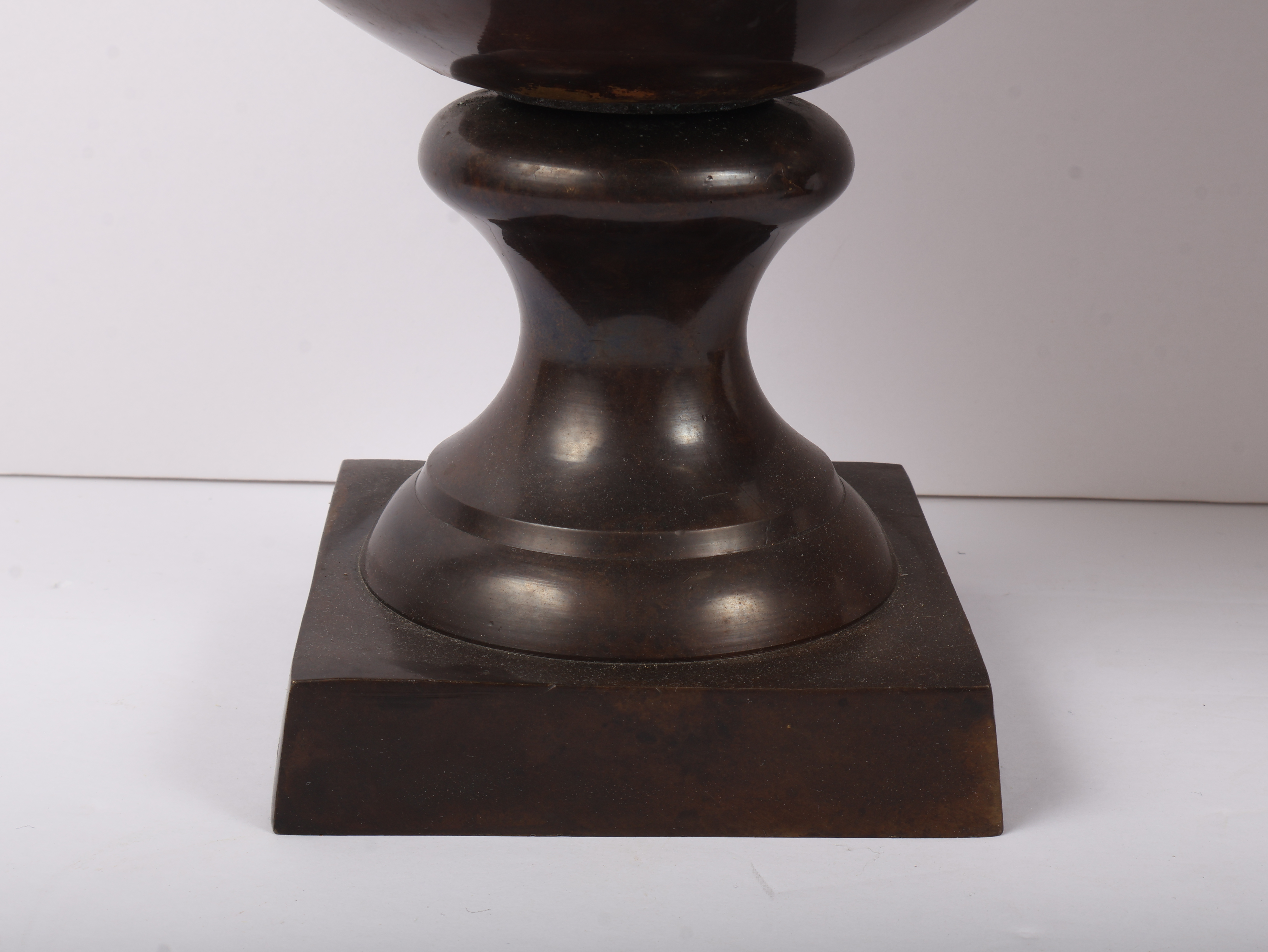A Pair of Neoclassical Style Brass Urns with Dolphin Handles