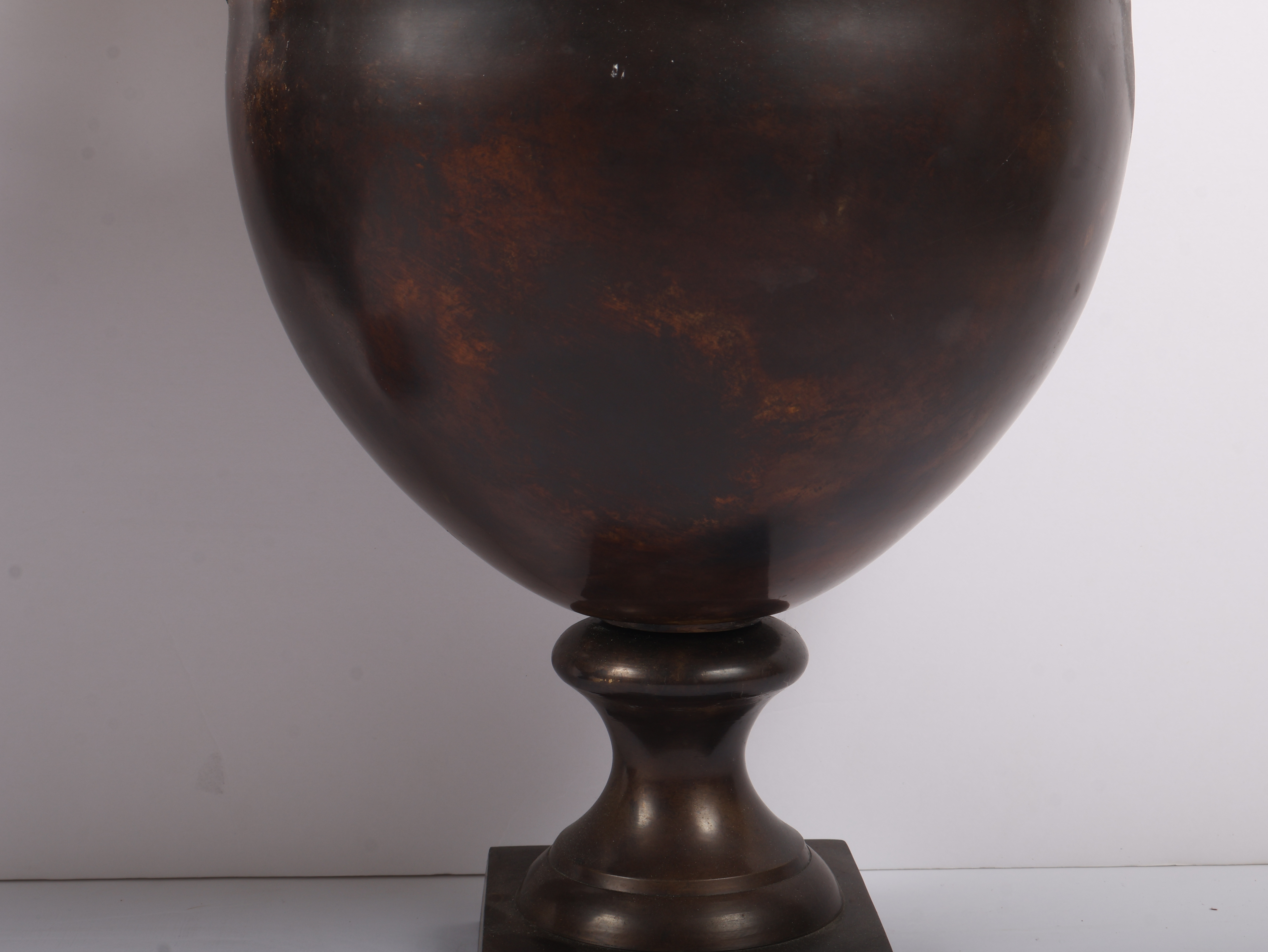 A Pair of Neoclassical Style Brass Urns with Dolphin Handles
