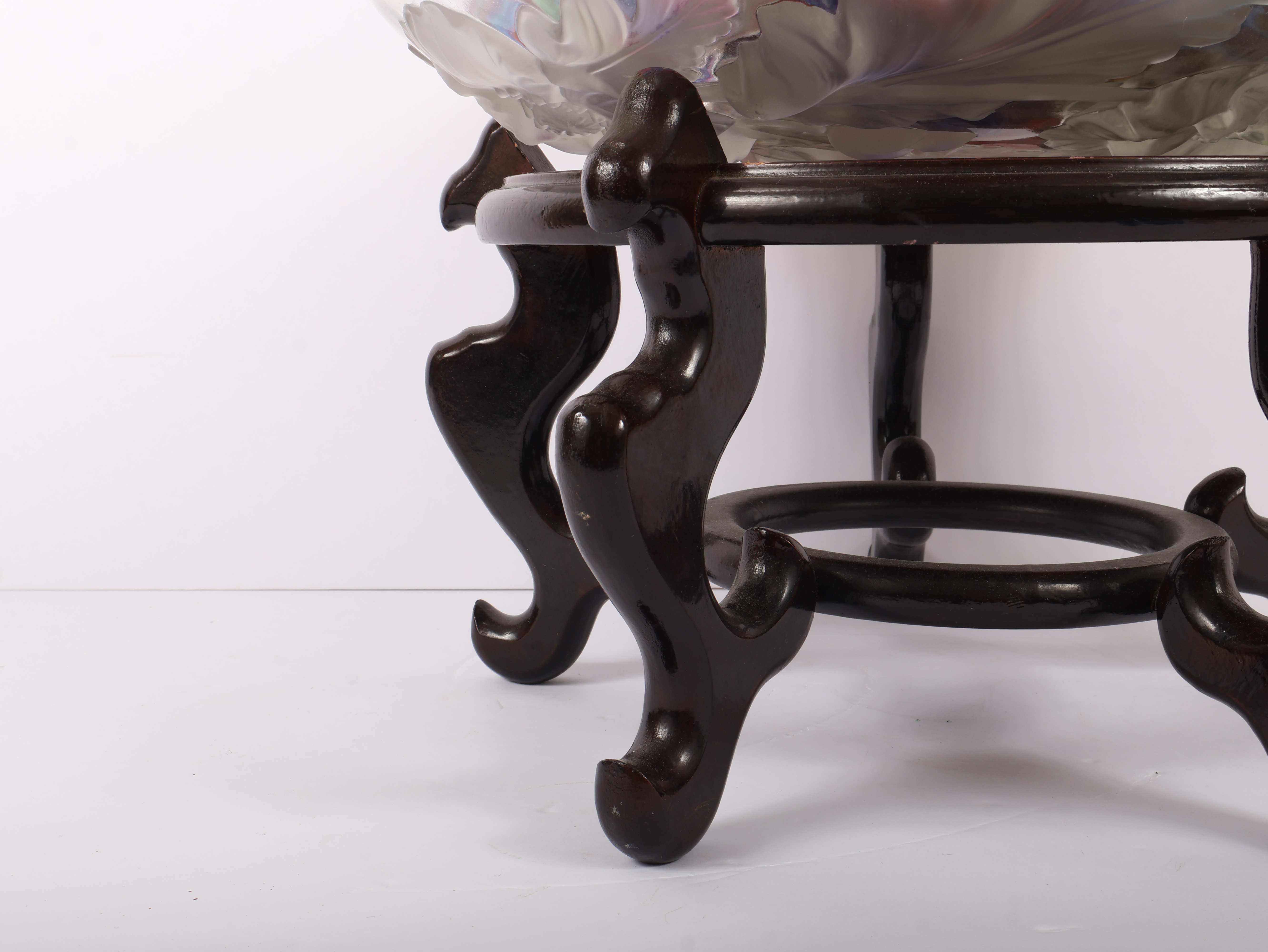 An Assortment of Eleven Blown Art Glass Spheres in a Frosted Glass Bowl on an Oriental Rosewood Stand