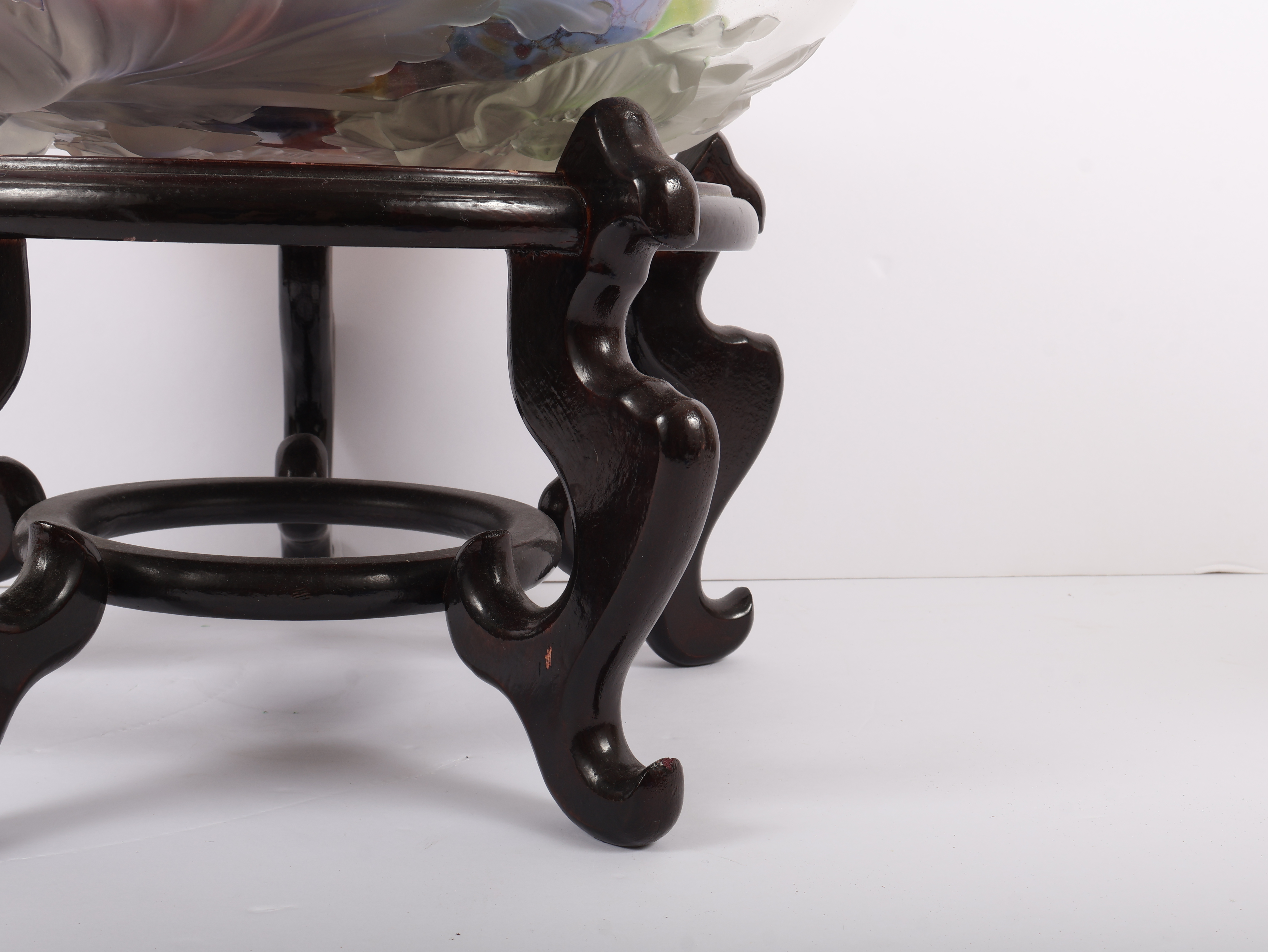 An Assortment of Eleven Blown Art Glass Spheres in a Frosted Glass Bowl on an Oriental Rosewood Stand