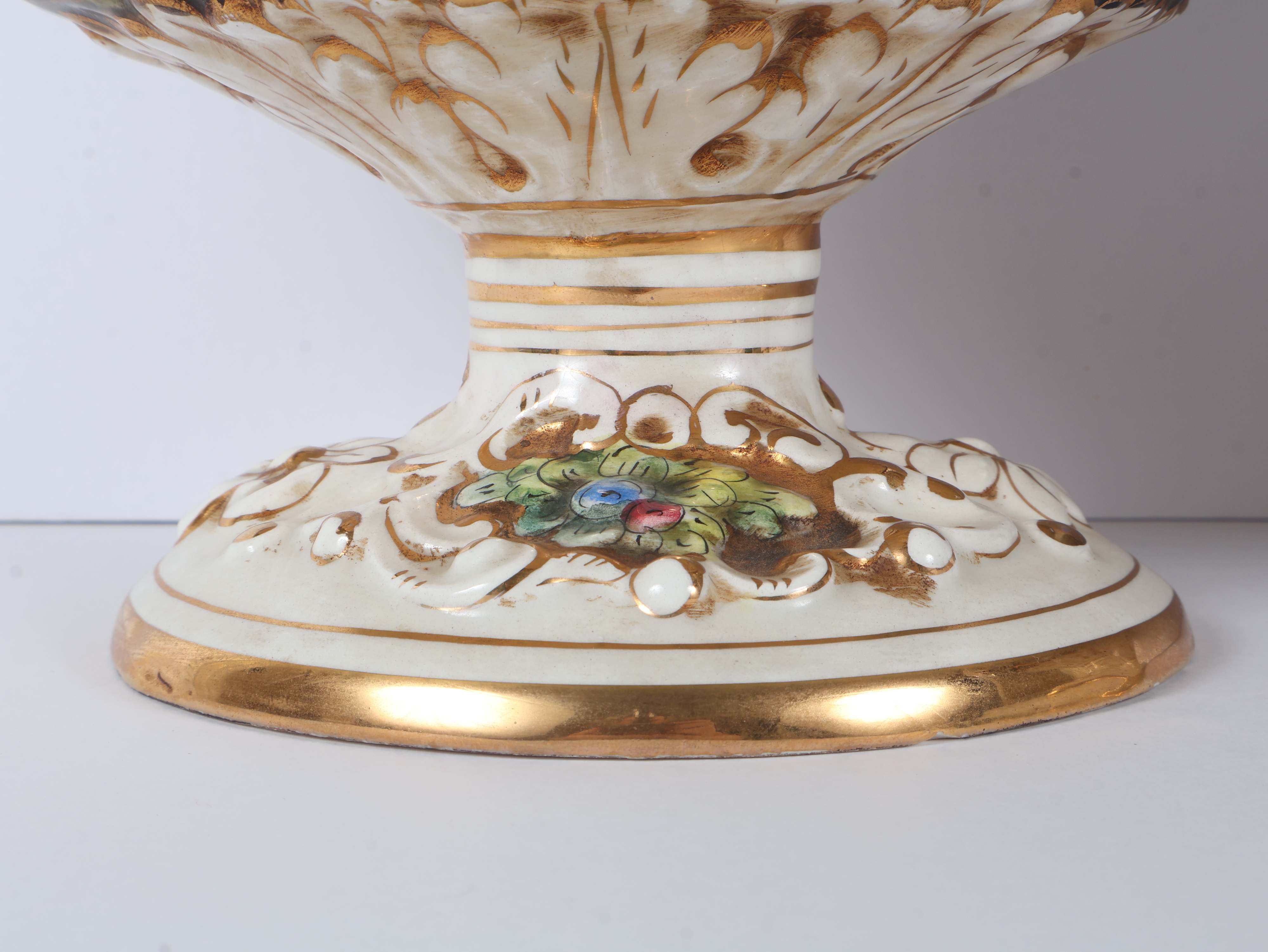 A Pair of Capodimonte Polychrome and Gilded Two-Handle Porcelain Vases