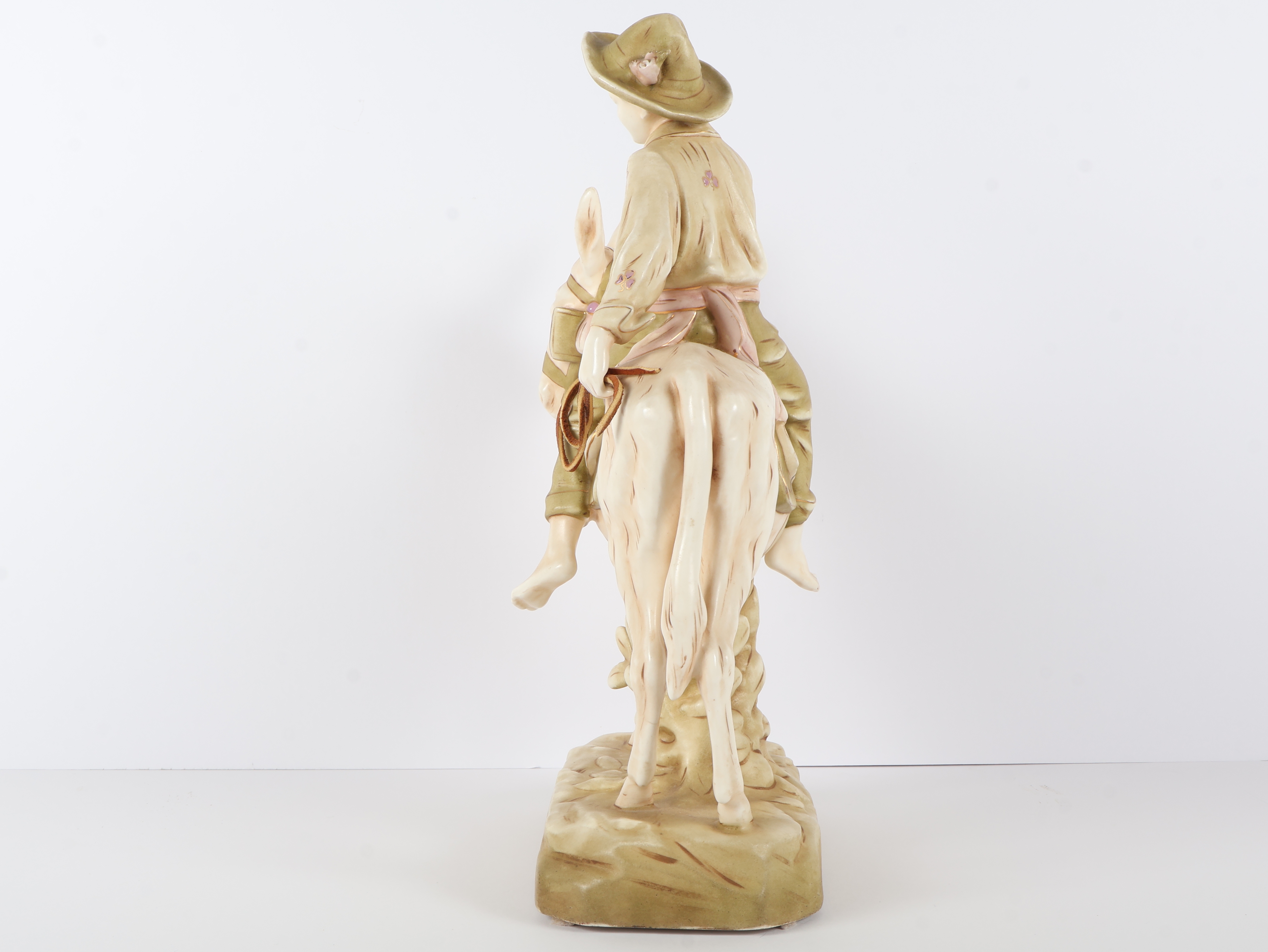 Large Austrian Bisque Porcelain Figurine of a Boy Riding a Donkey