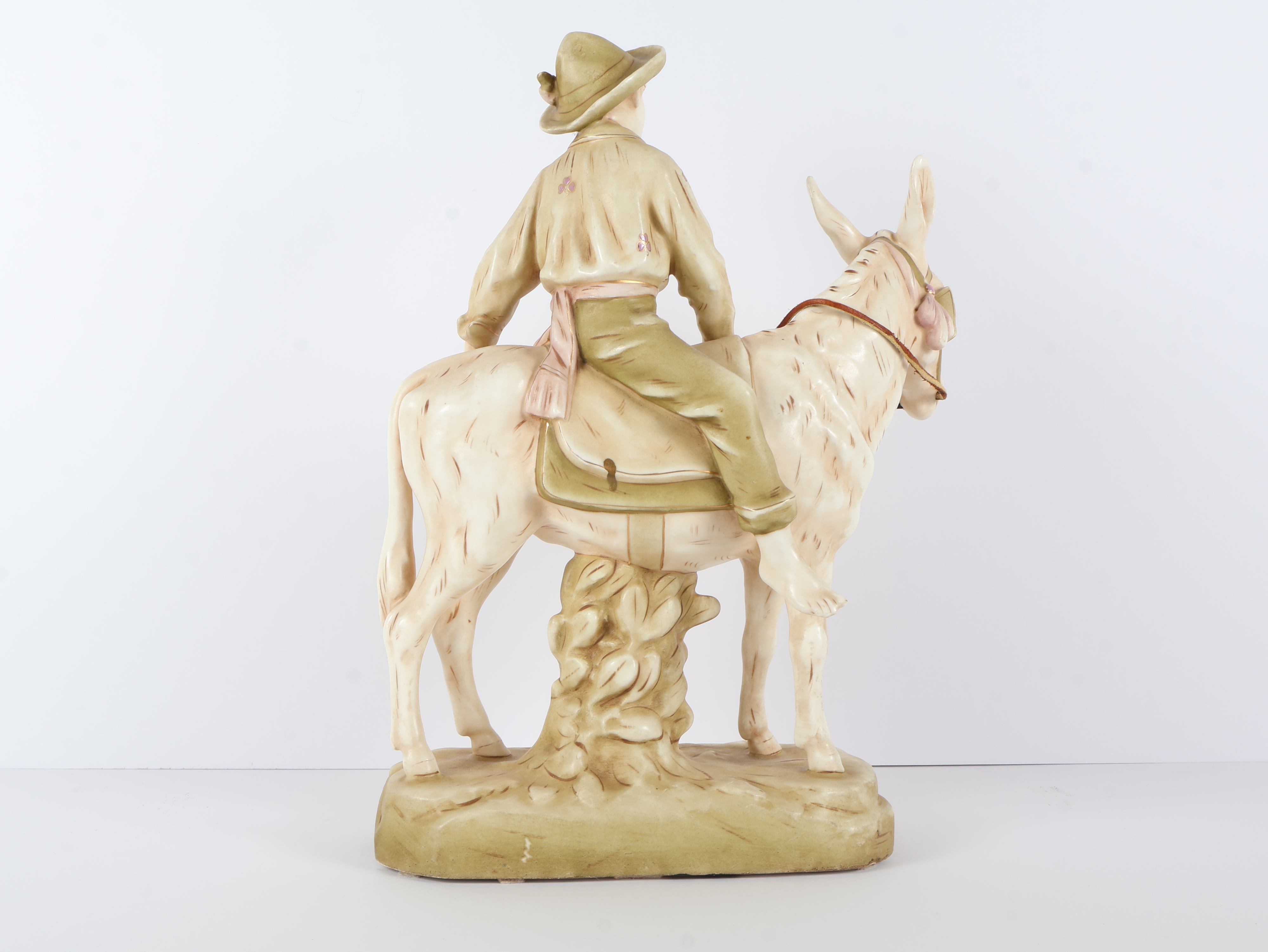 Large Austrian Bisque Porcelain Figurine of a Boy Riding a Donkey