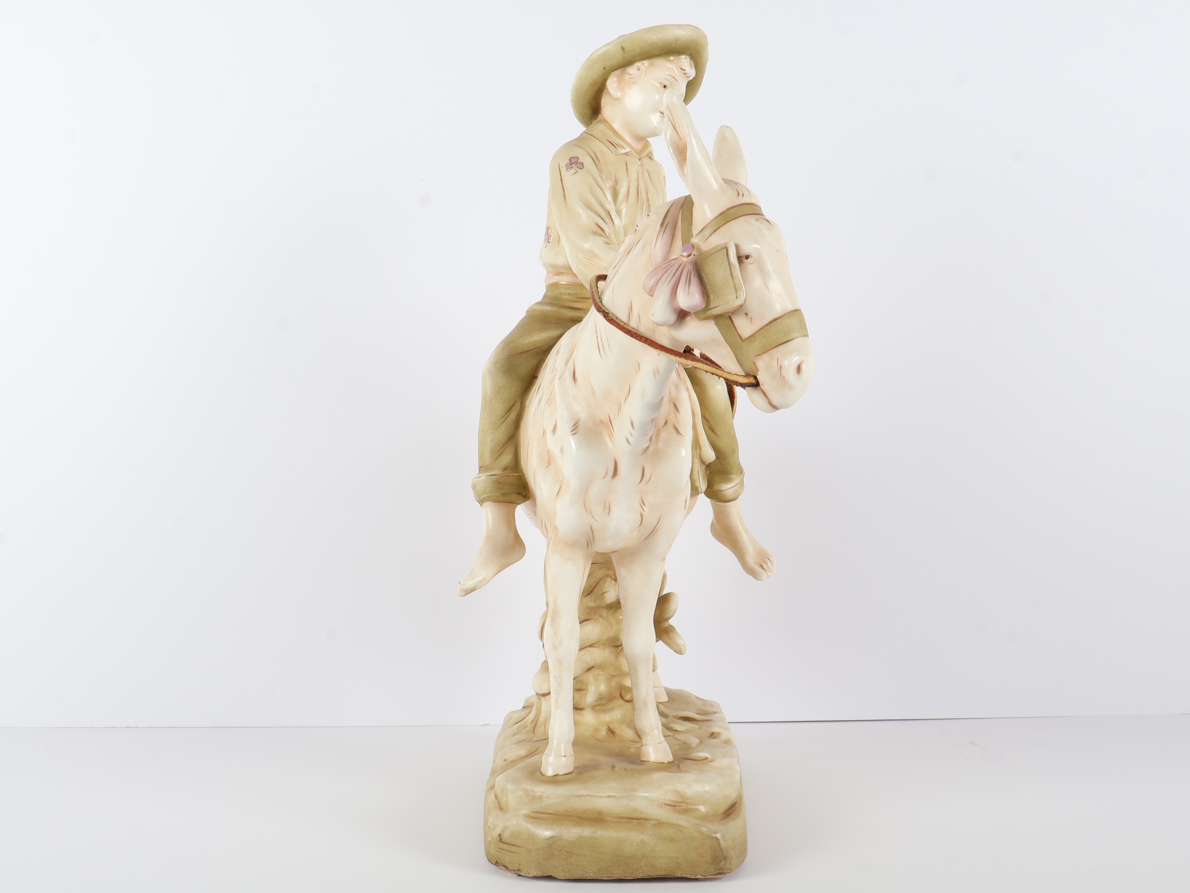 Large Austrian Bisque Porcelain Figurine of a Boy Riding a Donkey