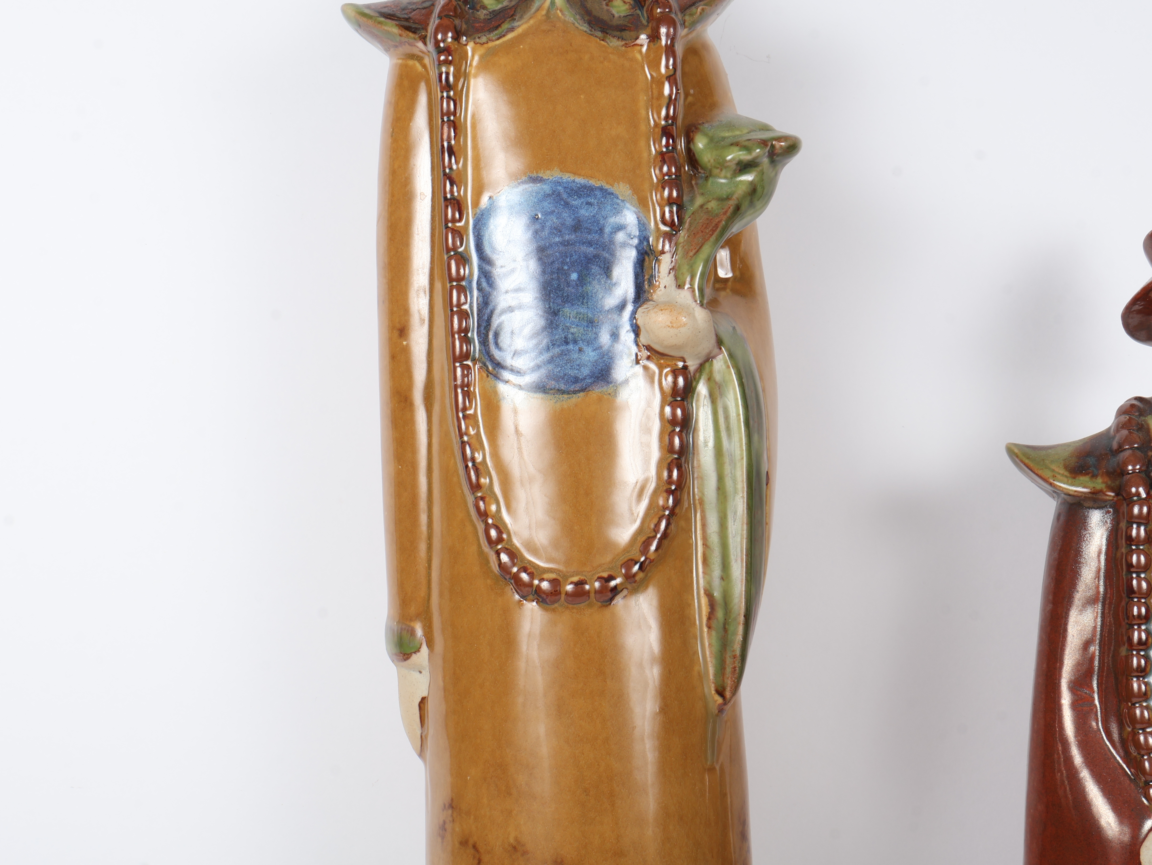 A Pair of Large Stylized Glazed Ceramic Chinese Official Figurines