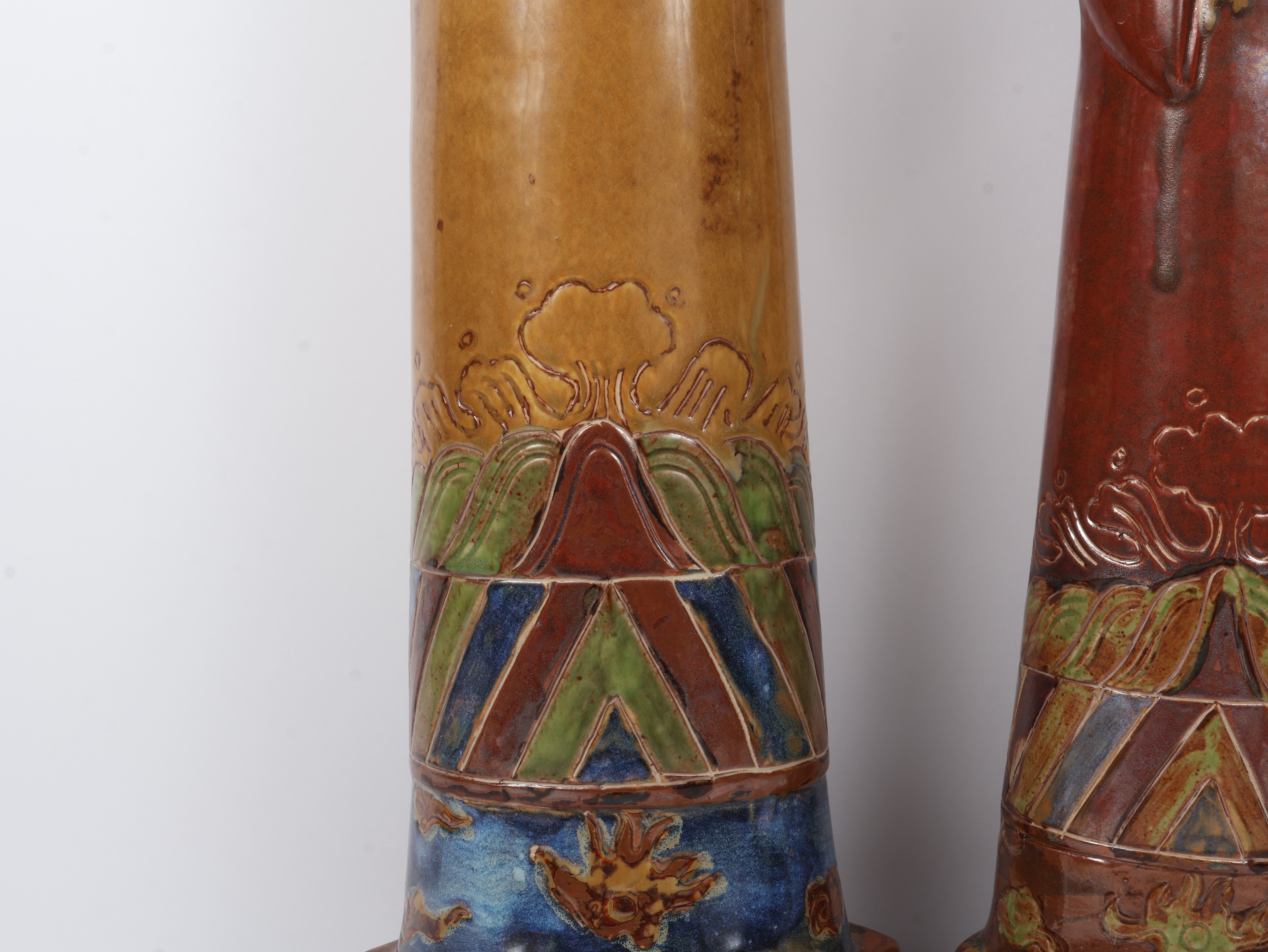 A Pair of Large Stylized Glazed Ceramic Chinese Official Figurines