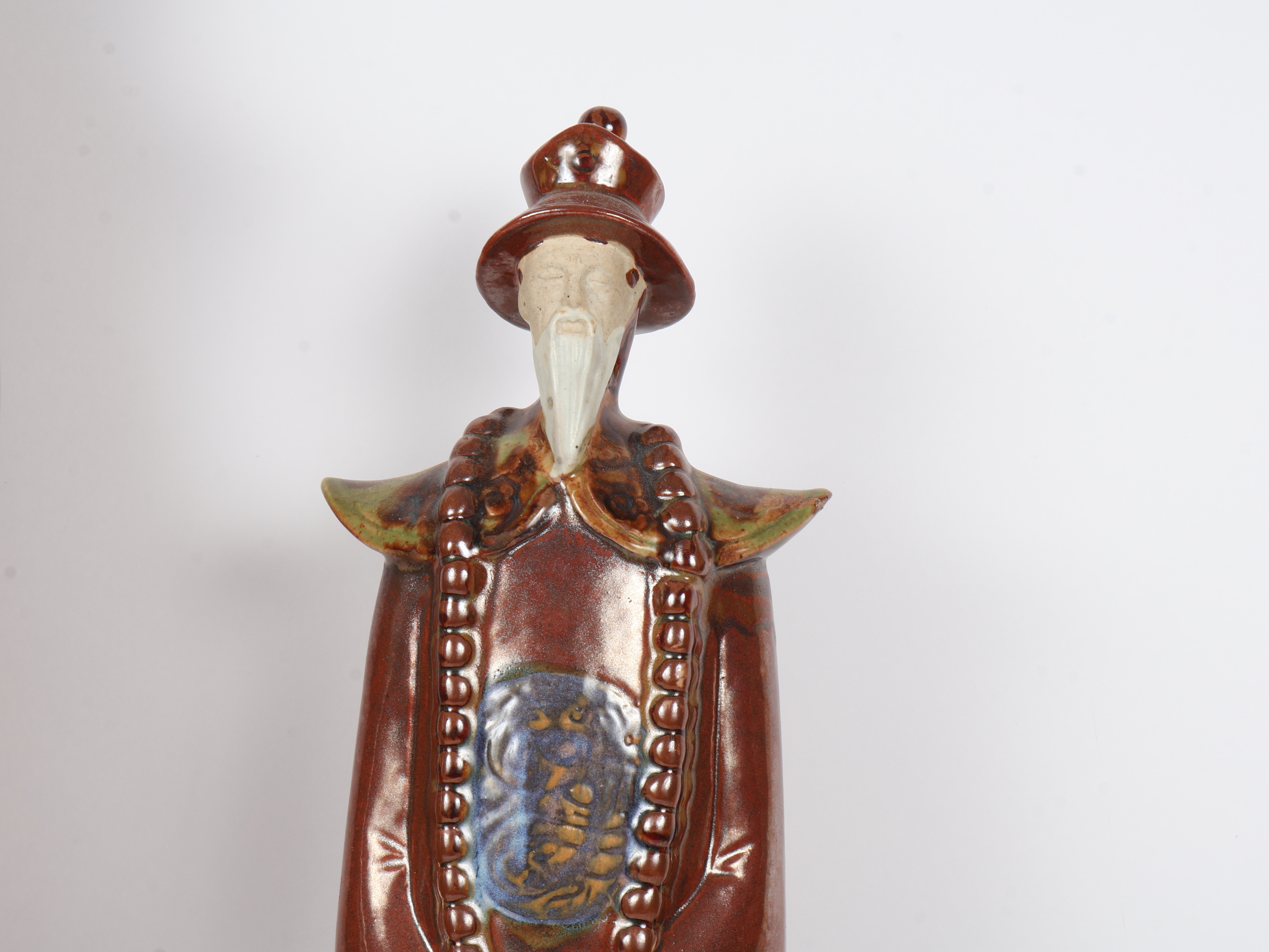 A Pair of Large Stylized Glazed Ceramic Chinese Official Figurines