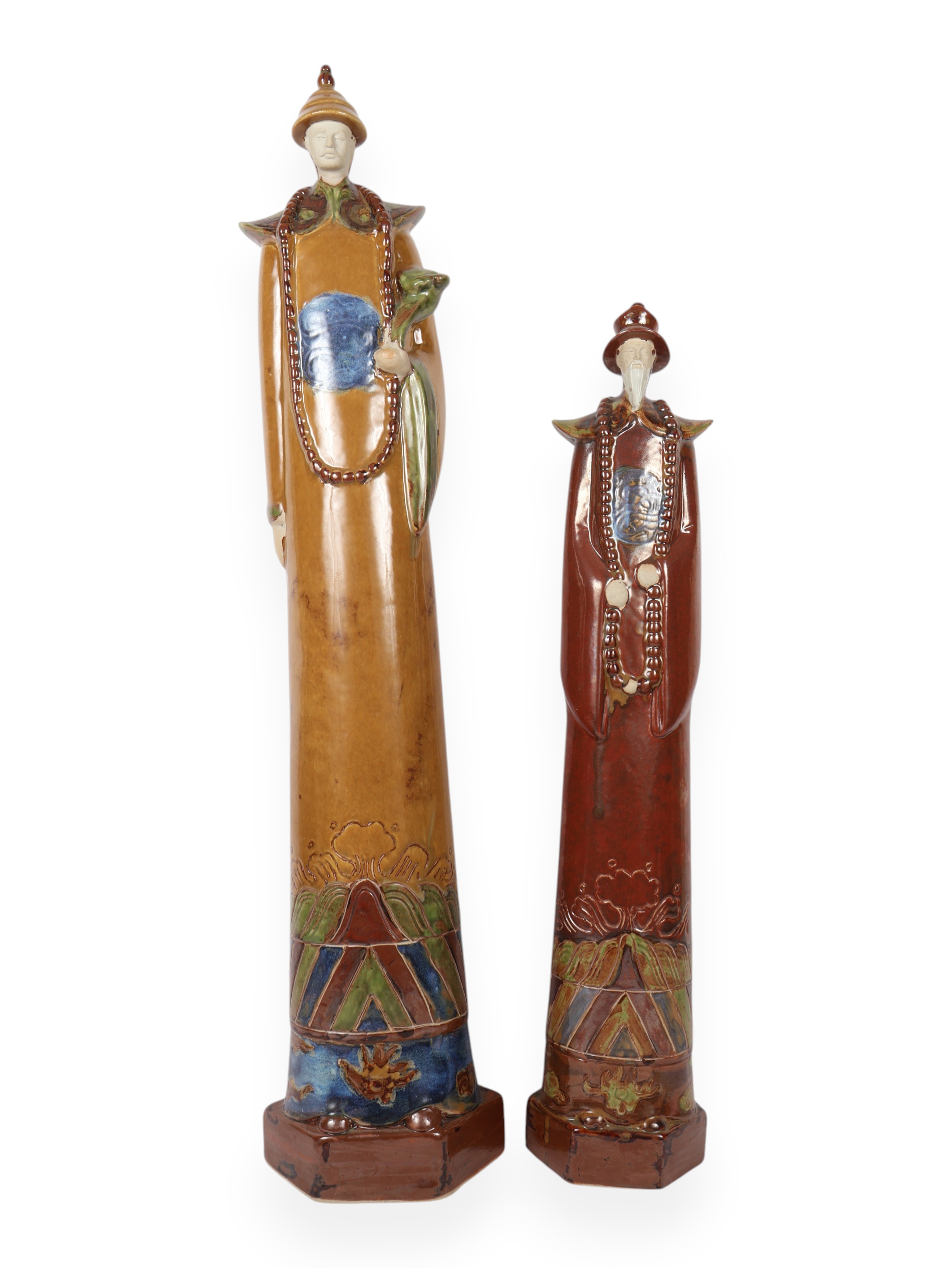 A Pair of Large Stylized Glazed Ceramic Chinese Official Figurines
