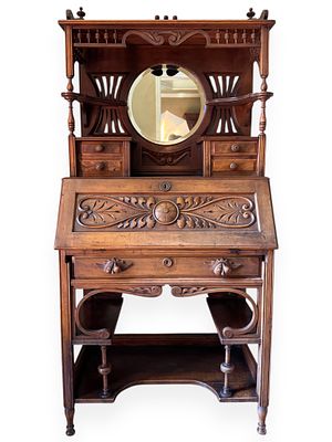 Late Victorian Carved Walnut Fall-Front Secretary Desk. A Late Victorian fall-front secretary 