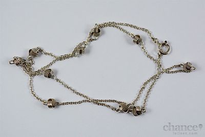 Colar com "novelos" em Prata Portuguesa, contraste Águia com toque 925 e peso de 5,4gr.