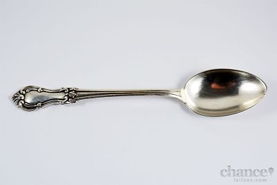 Colher em Prata Portuguesa, contraste &Aacute;guia com toque 833 e peso de 63gr. Comp. 19,5cm