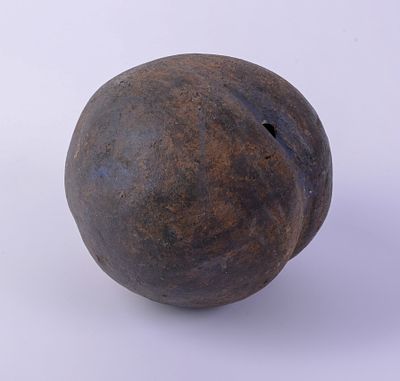 Large Porcelain Peach. Length 10 inches.